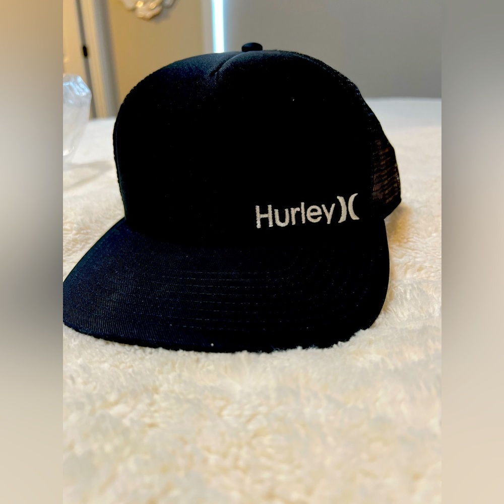 Hurley black trucker hat. New with tags